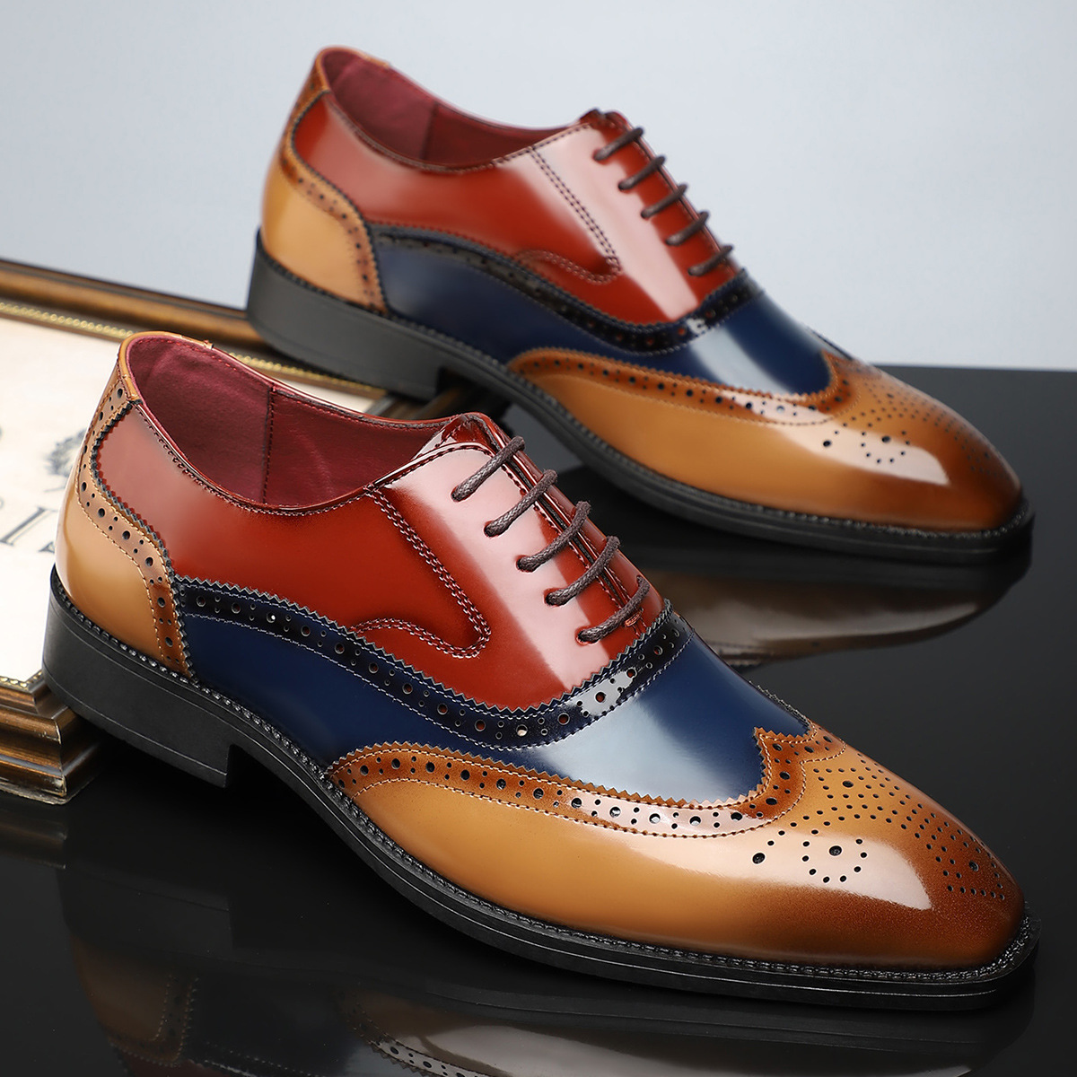Herresko i patentlær med broguedetaljer – Stilig wingtip-design for formelle anledninger